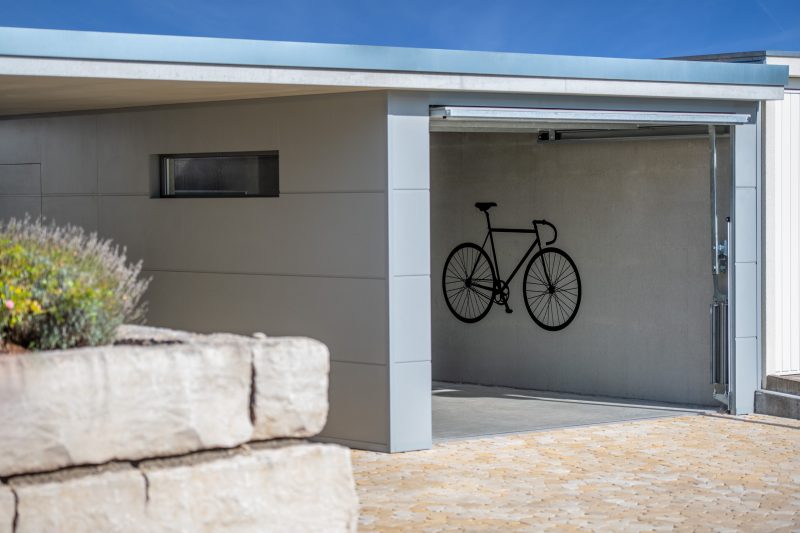 Einzelgarage mit Carport
