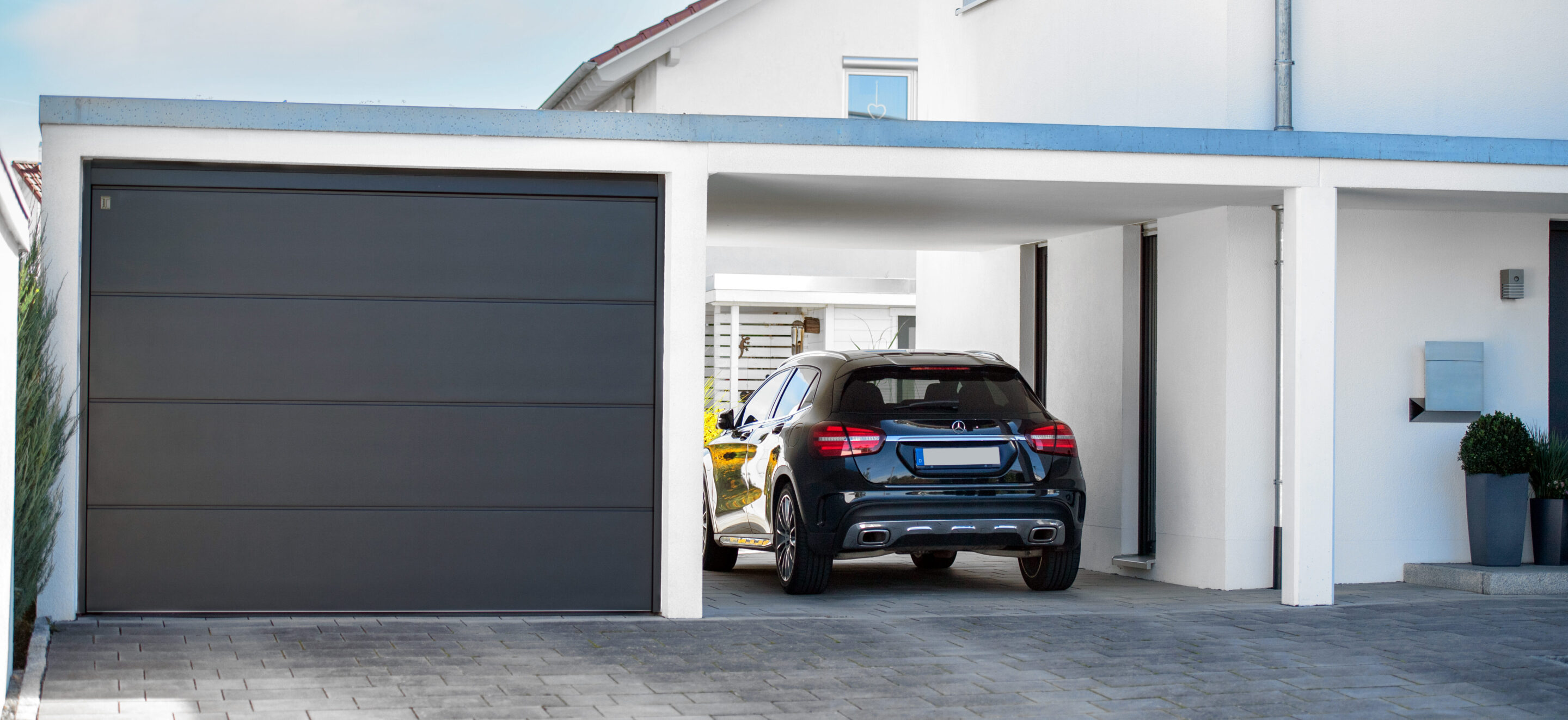 Einzelgarage mit Carport